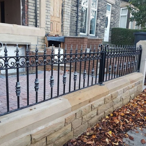 Wrought iron arrow fence