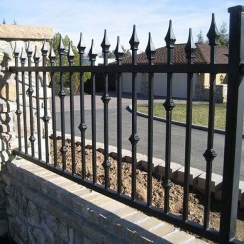 Wrought iron arrow fence