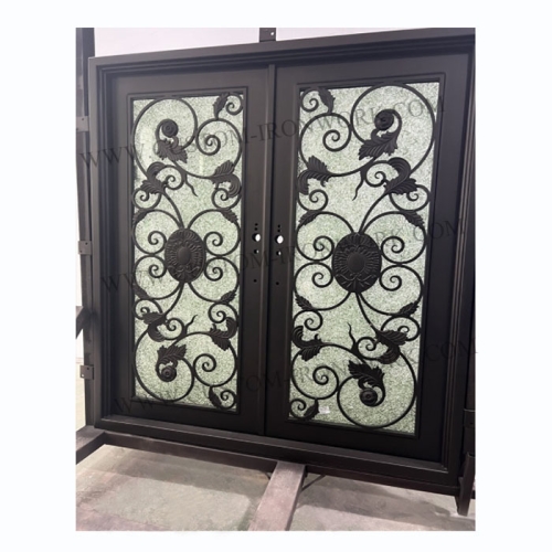 Hand-hammered iron door decorated entrance of house